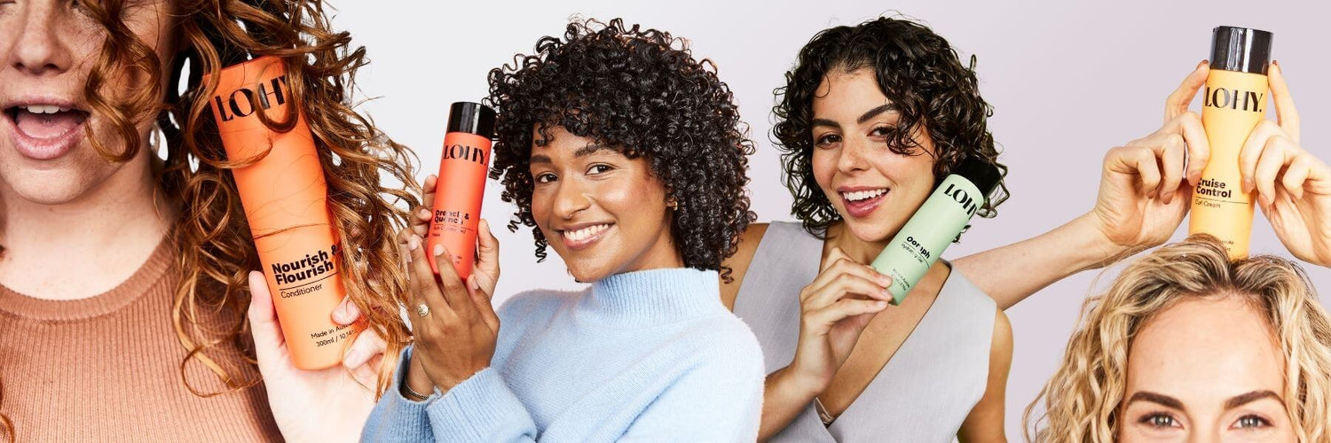Curly girls holding conditioning products