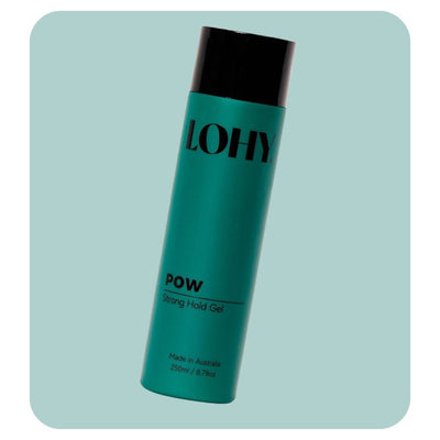 lohy pow strong hold gel for curly hair bottle angled on a pastel green background