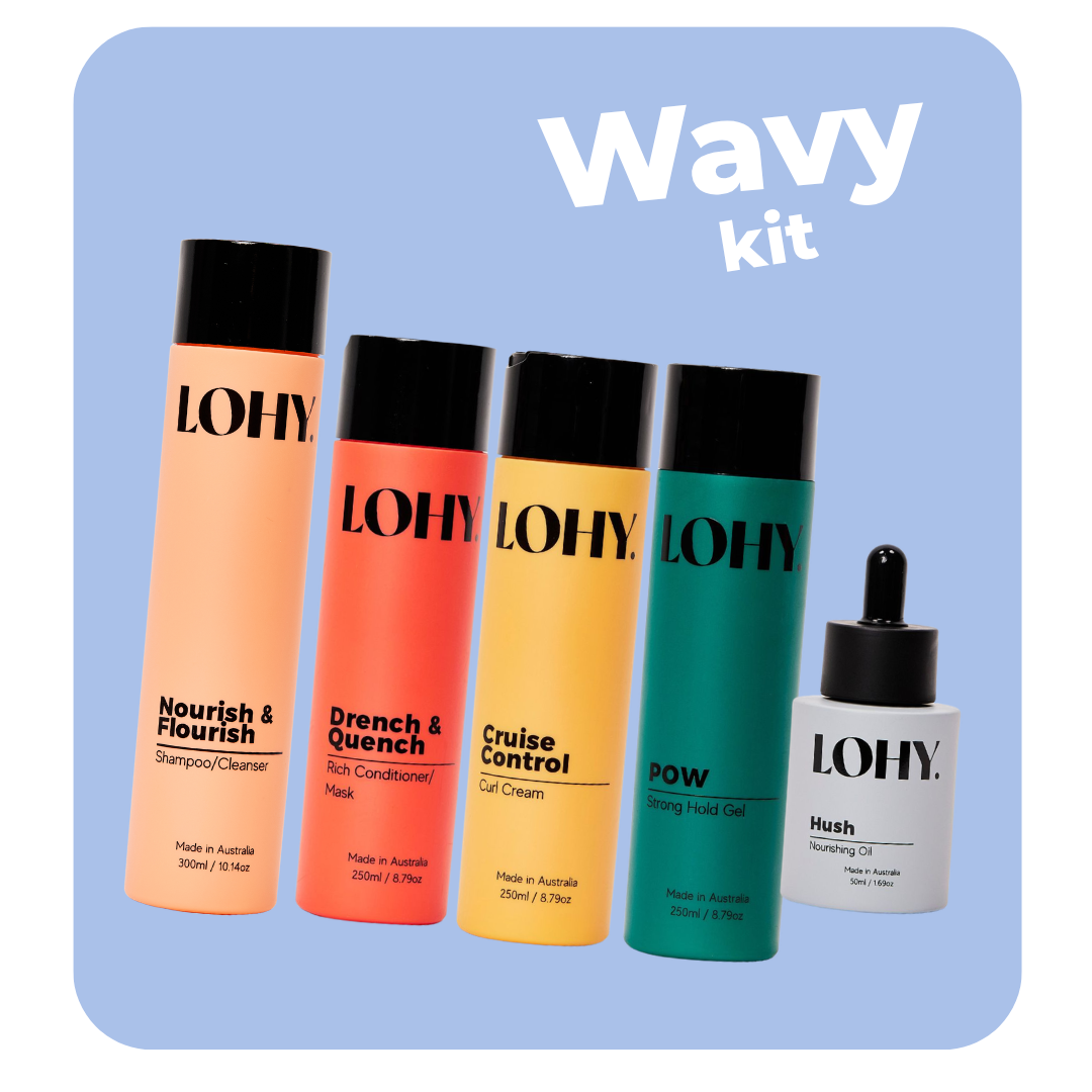 lohy. wavy coarse hair kit, which includes shampoo, rich conditioner, curl cream, strong hold gel and nourishing oil bottles angled on a pastel yellow background