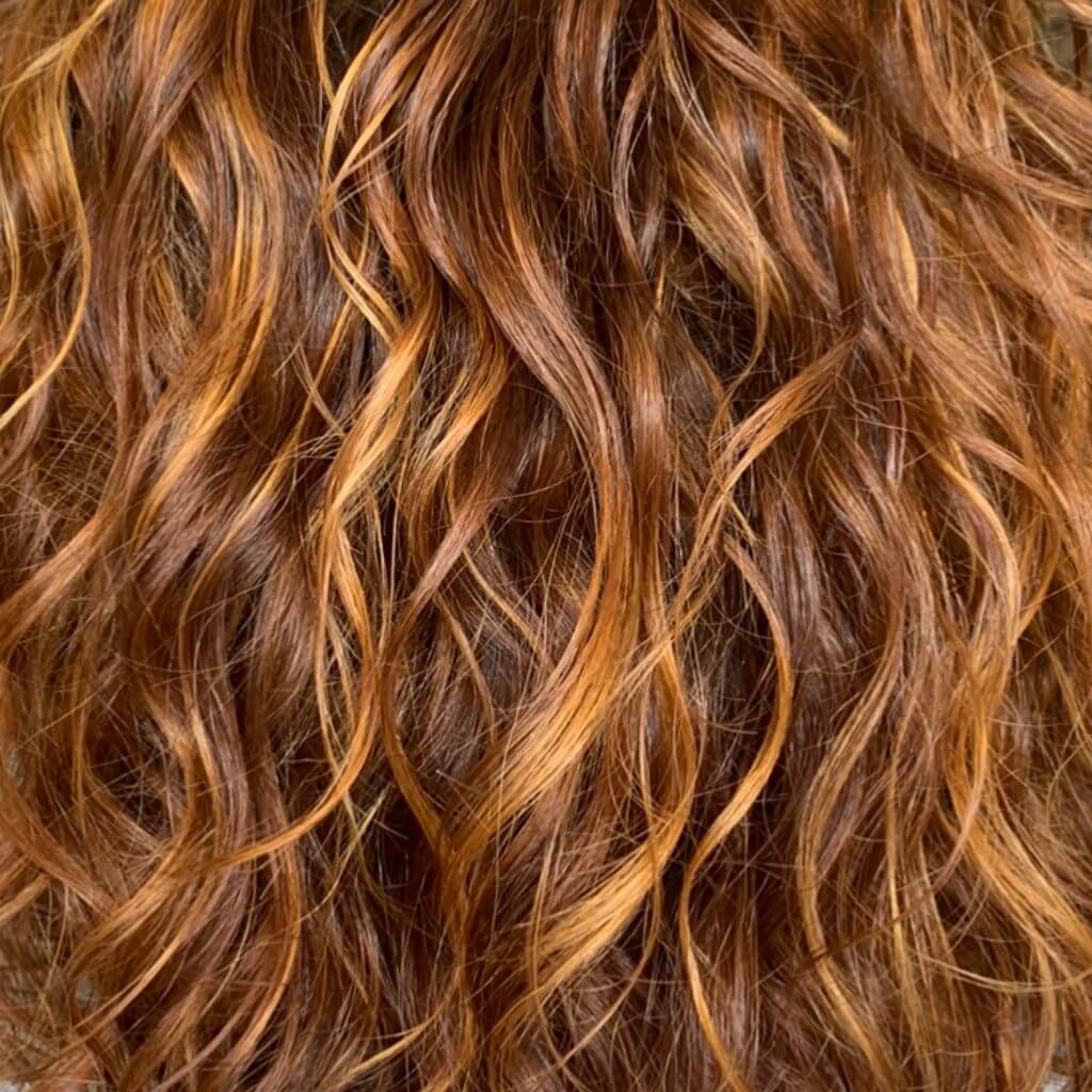 Wavy balayage curly hair 2b