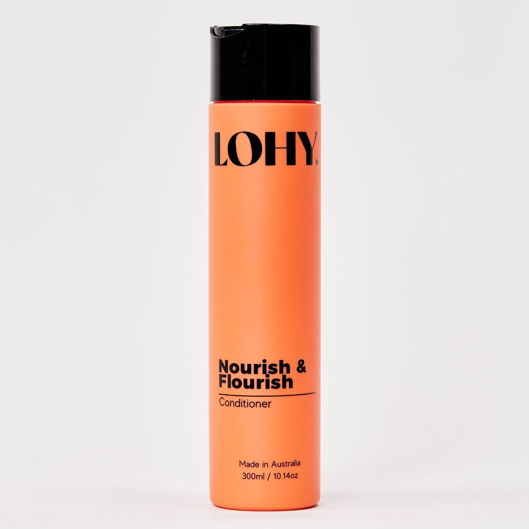 Orange 300ml bottle of curly hair leave-in conditioner
