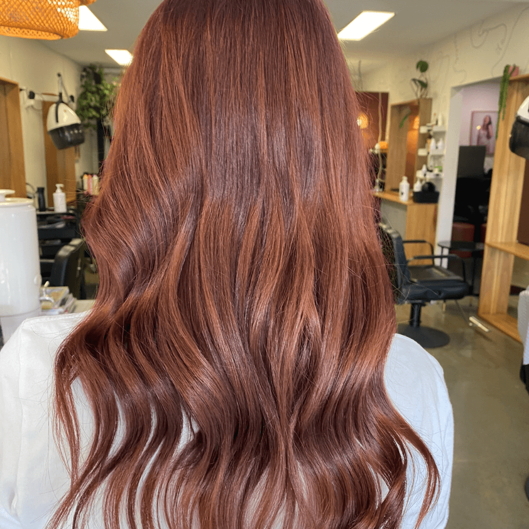 woman with long wavy red hair