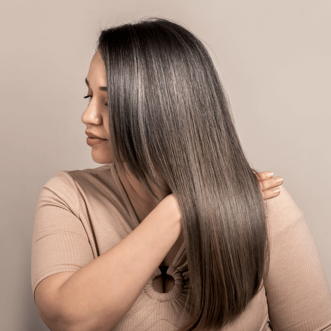 Lady with mid length brunette hair