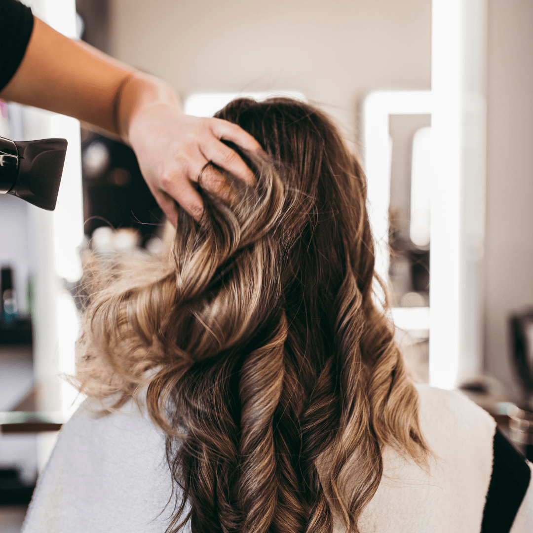 woman with long wavy brunette hair