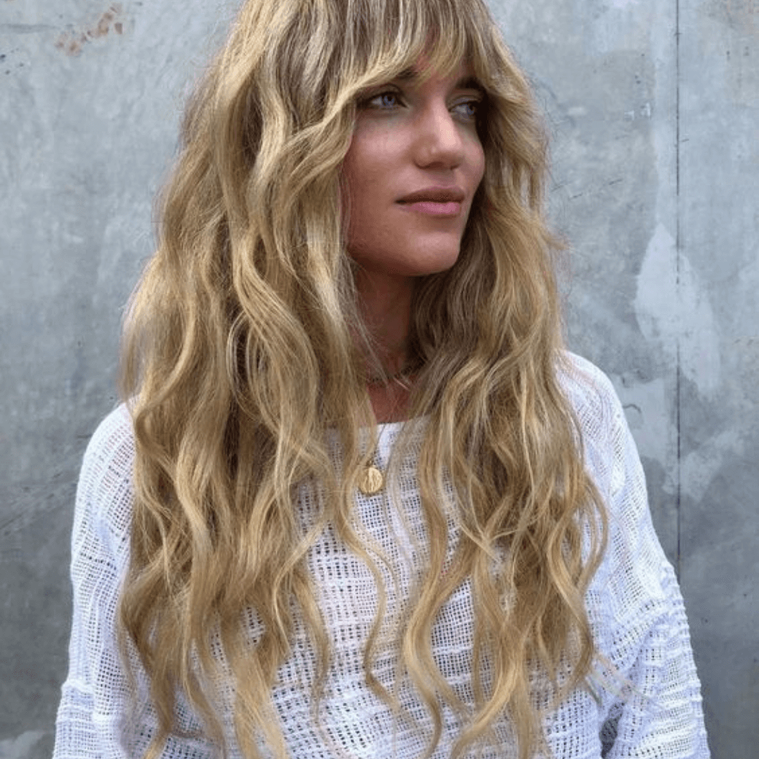 lady with long wavy blonde hair