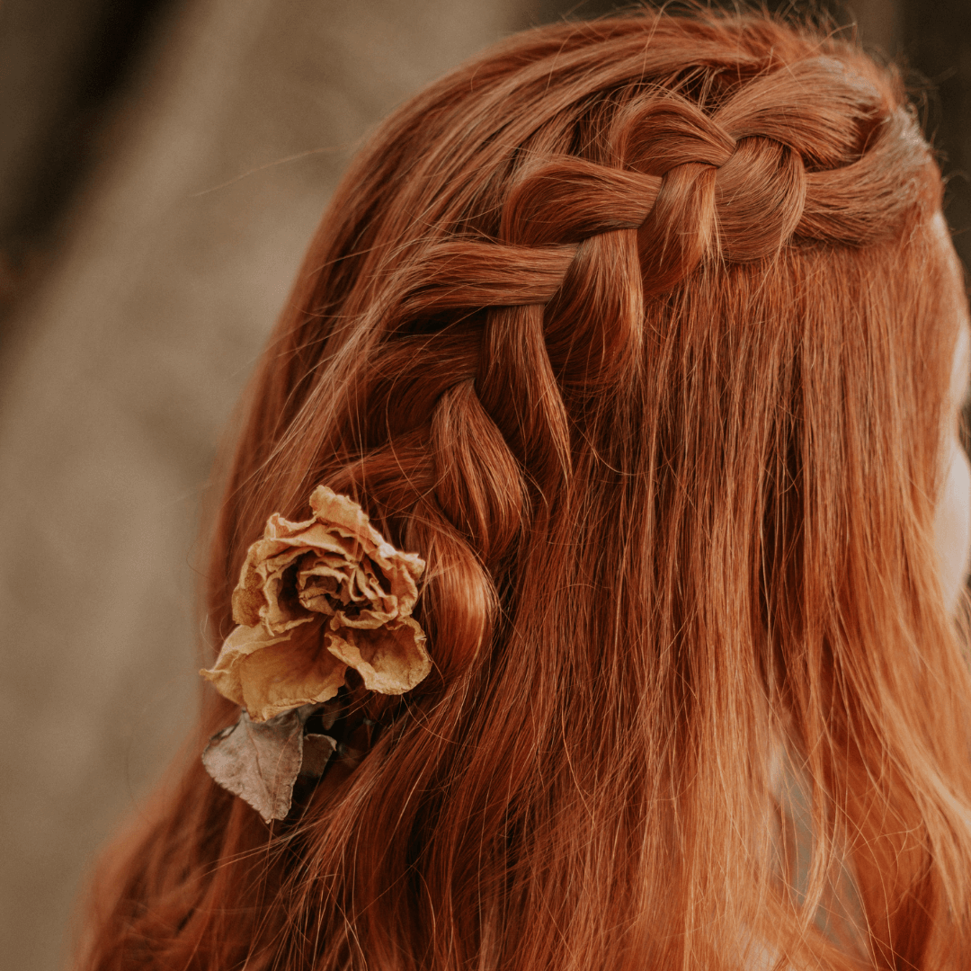 Woman with red hair in braid