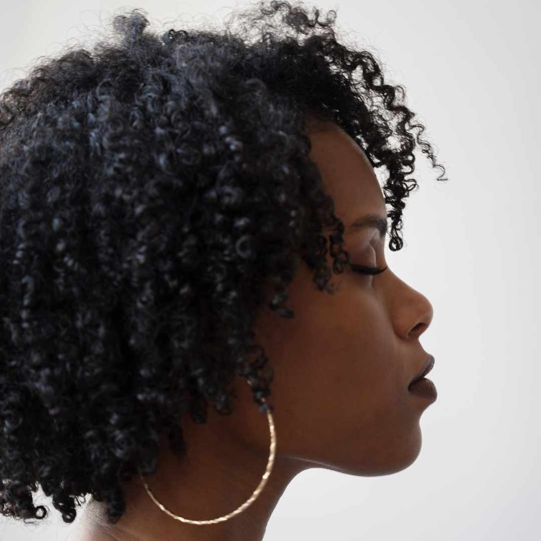 woman, black curly hair