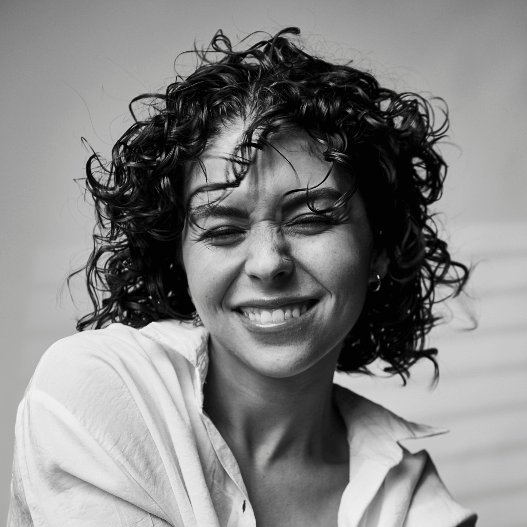 girl with short curly brunette hair