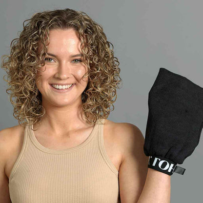 Blonde curly girl with the LOHY glove